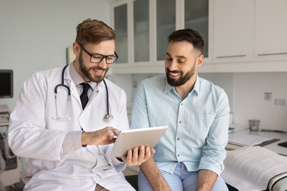 doctor and patient discussing care plan during primary care appointment
